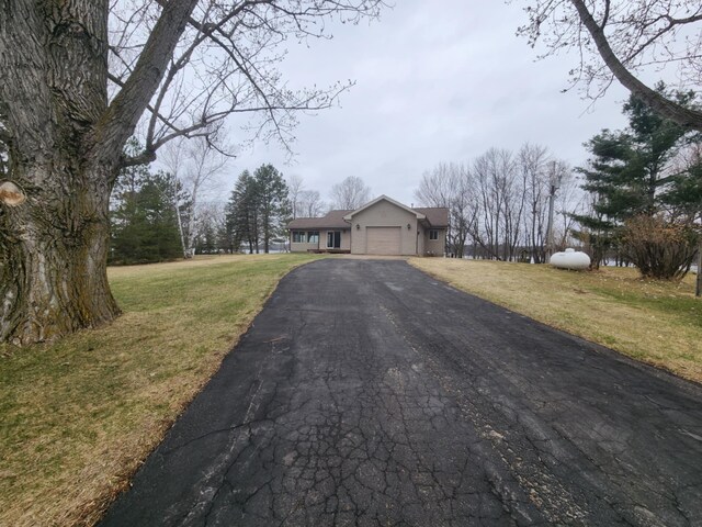 view of street with driveway