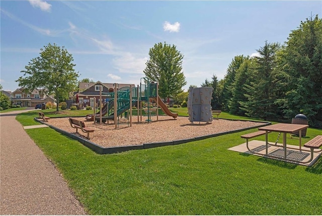 community jungle gym with a yard