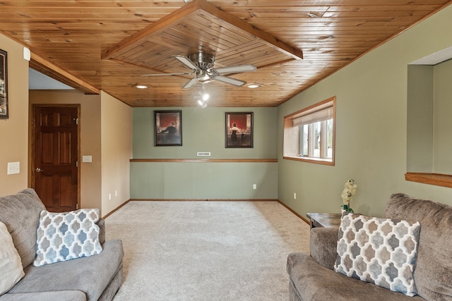 carpeted living room featuring wooden ceiling, ceiling fan, and baseboards
