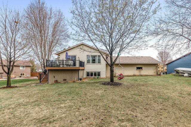 back of house with stairs, a wooden deck, and a yard