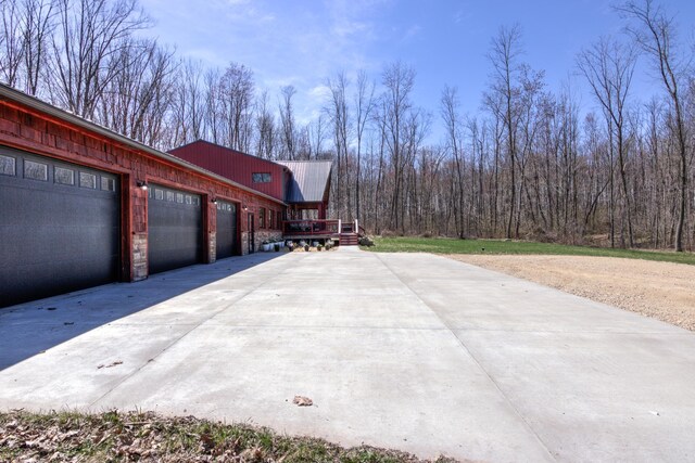 546 315th St, Cady Twp, WI 54749 - view of home's exterior with an attached garage and driveway