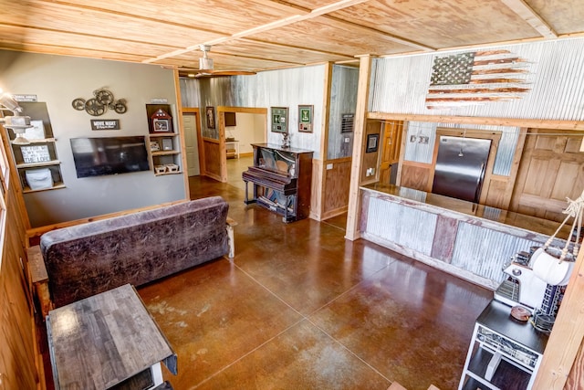 546 315th St, Cady Twp, WI 54749 - living room featuring wood ceiling and finished concrete flooring