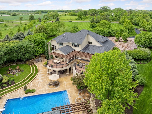 7250 Jubert Ln, Corcoran, MN 55340 - view from above of property featuring a pool and a tree filled landscape