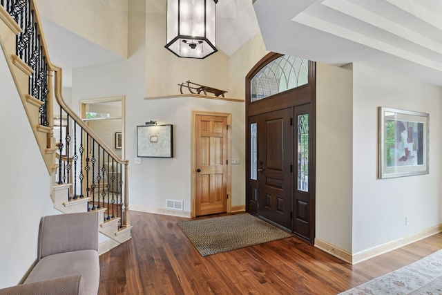 7250 Jubert Ln, Corcoran, MN 55340 - foyer featuring wood finished floors, baseboards, and stairway