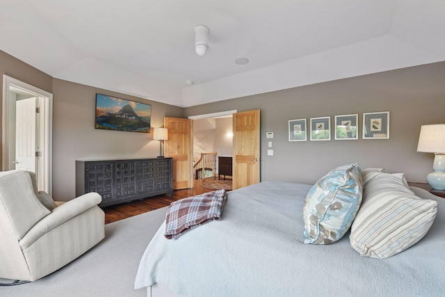 7250 Jubert Ln, Corcoran, MN 55340 - bedroom with wood finished floors and a tray ceiling