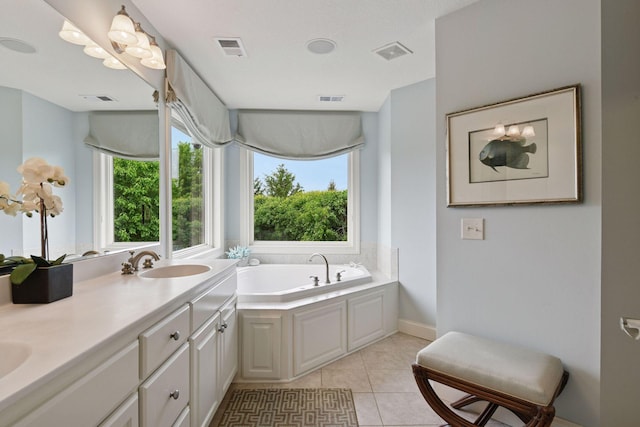 7250 Jubert Ln, Corcoran, MN 55340 - full bath featuring plenty of natural light, a bath, double vanity, and tile patterned floors