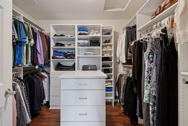 7250 Jubert Ln, Corcoran, MN 55340 - walk in closet featuring dark wood-style floors and attic access