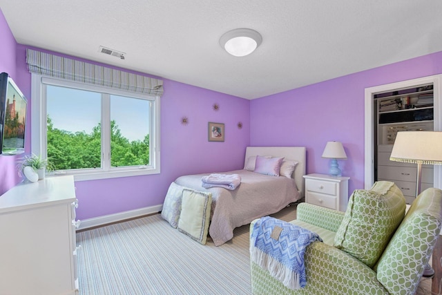 7250 Jubert Ln, Corcoran, MN 55340 - carpeted bedroom featuring baseboards
