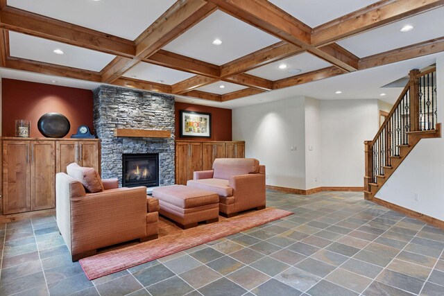 7250 Jubert Ln, Corcoran, MN 55340 - living area with baseboards, coffered ceiling, a stone fireplace, beamed ceiling, and recessed lighting