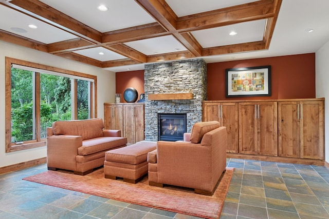 7250 Jubert Ln, Corcoran, MN 55340 - living area featuring stone tile flooring, a fireplace, baseboards, beam ceiling, and coffered ceiling