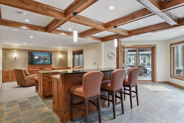 7250 Jubert Ln, Corcoran, MN 55340 - indoor bar with beam ceiling, healthy amount of natural light, recessed lighting, baseboards, and stone tile flooring