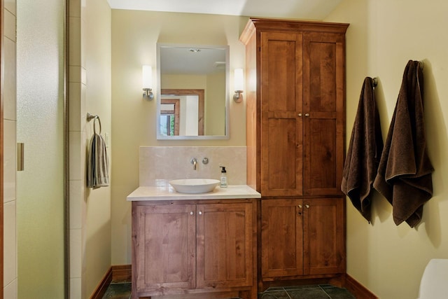 7250 Jubert Ln, Corcoran, MN 55340 - full bathroom featuring vanity, tasteful backsplash, baseboards, and tile patterned floors