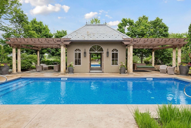 7250 Jubert Ln, Corcoran, MN 55340 - outdoor pool with an exterior structure, a pergola, an outbuilding, and a patio area