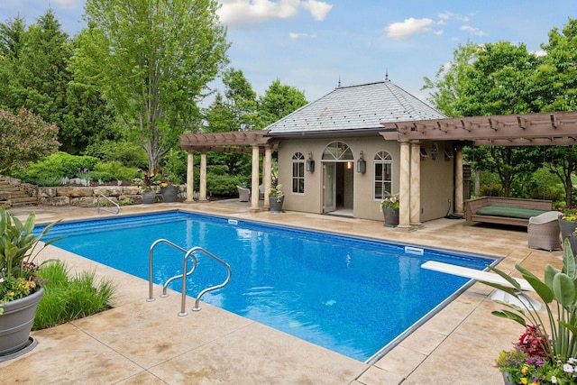7250 Jubert Ln, Corcoran, MN 55340 - outdoor pool featuring a pergola, a storage structure, an outdoor structure, a patio area, and a diving board