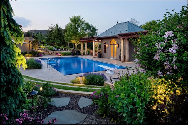 7250 Jubert Ln, Corcoran, MN 55340 - swimming pool featuring a diving board and a patio