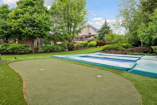 7250 Jubert Ln, Corcoran, MN 55340 - view of home's community with a putting area and a lawn