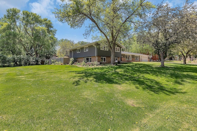 view of yard with an attached garage