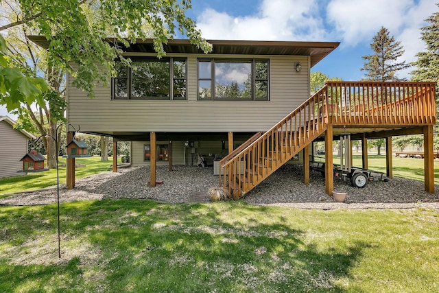 1410 4th Ave N, Sartell, MN 56377 - rear view of house featuring a yard, a deck, and stairway