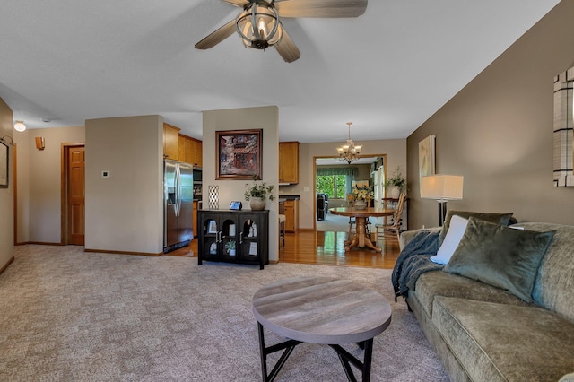 1410 4th Ave N, Sartell, MN 56377 - living area with light colored carpet, a chandelier, a ceiling fan, and baseboards