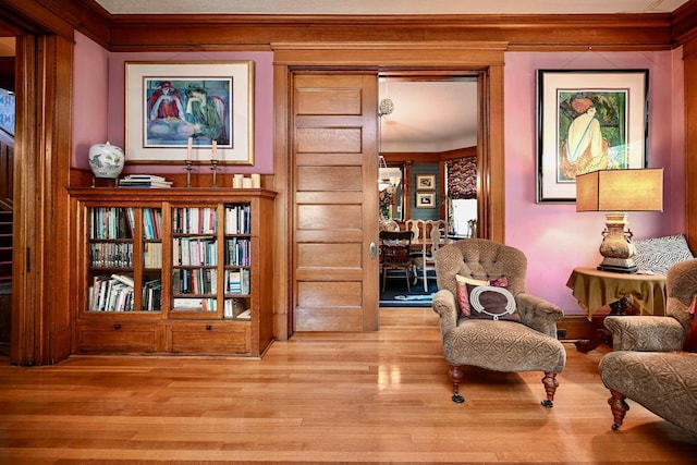 265 Broadway St, Winona, MN 55987 - living area featuring crown molding and wood finished floors