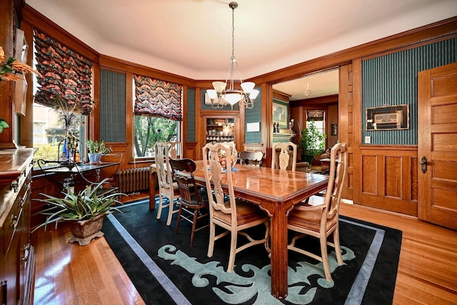 265 Broadway St, Winona, MN 55987 - dining area featuring a chandelier and wood finished floors