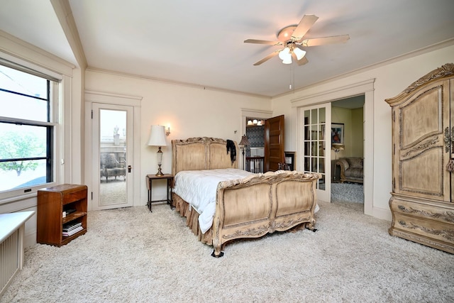 265 Broadway St, Winona, MN 55987 - bedroom with light carpet, french doors, ceiling fan, access to exterior, and crown molding