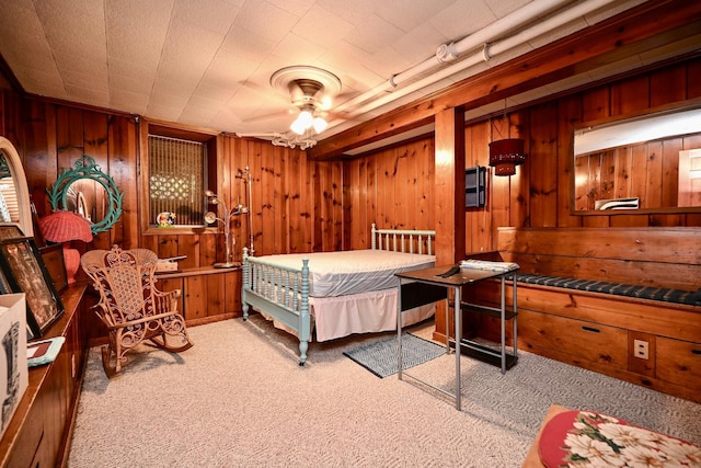 265 Broadway St, Winona, MN 55987 - carpeted bedroom featuring wooden walls
