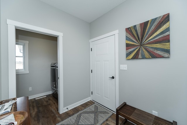 entrance foyer featuring wood finished floors, visible vents, and baseboards