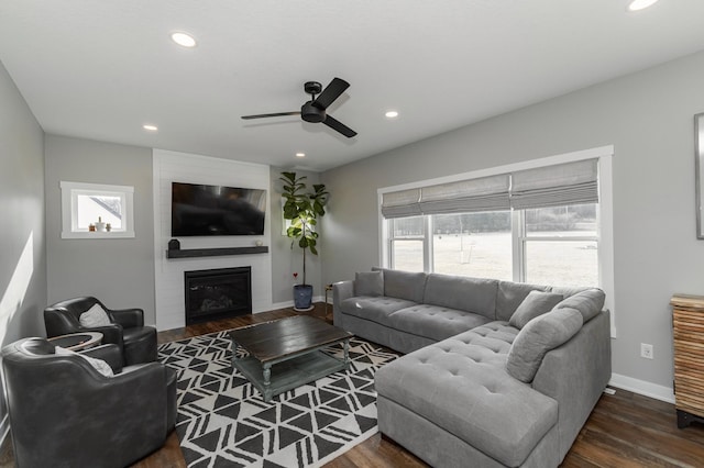 1261 Skyview Cir NW, Rochester, MN 55901 - living room featuring healthy amount of natural light, dark wood-style floors, baseboards, and recessed lighting