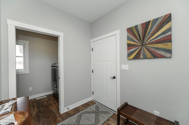 1261 Skyview Cir NW, Rochester, MN 55901 - foyer entrance featuring wood finished floors, baseboards, and washer / clothes dryer