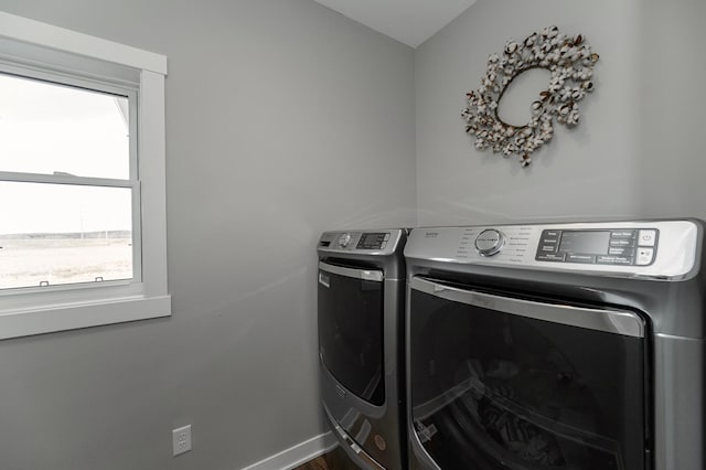 1261 Skyview Cir NW, Rochester, MN 55901 - laundry room with separate washer and dryer and baseboards