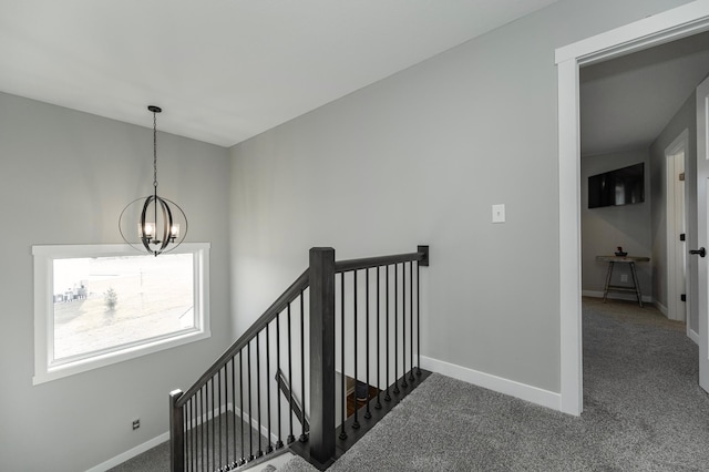 1261 Skyview Cir NW, Rochester, MN 55901 - stairs with a chandelier, carpet floors, and baseboards