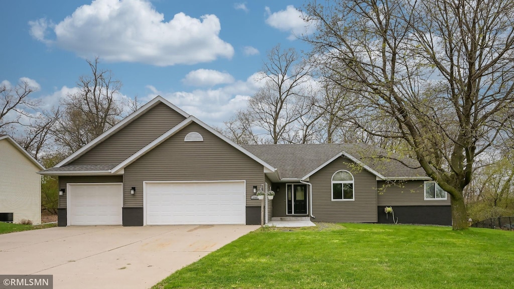 single story home with a front lawn, driveway, a shingled roof, and a garage
