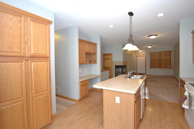 11096 16th St NE, Saint Michael, MN 55376 - kitchen with a kitchen island with sink, a sink, open floor plan, light countertops, and white appliances