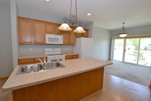 11096 16th St NE, Saint Michael, MN 55376 - kitchen with white appliances, a sink, light countertops, and recessed lighting