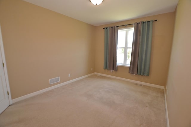 11096 16th St NE, Saint Michael, MN 55376 - spare room featuring baseboards and light carpet