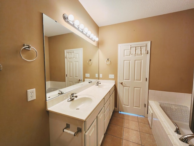 11096 16th St NE, Saint Michael, MN 55376 - bathroom featuring tile patterned floors, a relaxing tiled tub, and double vanity