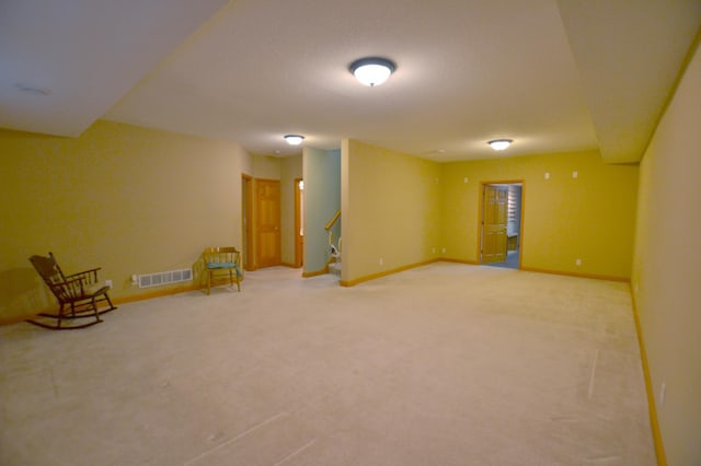 11096 16th St NE, Saint Michael, MN 55376 - finished below grade area with baseboards, stairway, and carpet flooring