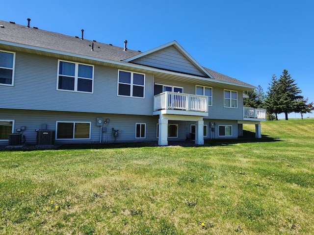 11096 16th St NE, Saint Michael, MN 55376 - back of property featuring a yard, central AC unit, and roof with shingles