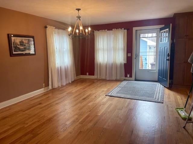 5475 Main St W, Maple Plain, MN 55359 - entryway featuring a chandelier and light wood-style flooring