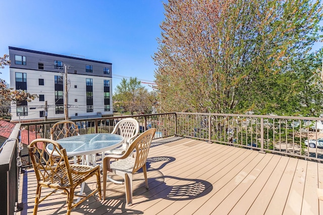 1976 Iglehart Ave, Saint Paul, MN 55104 - wooden terrace featuring outdoor dining area