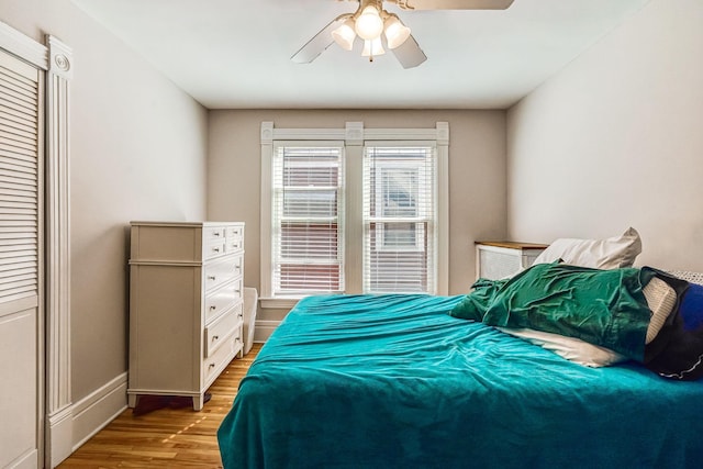 1976 Iglehart Ave, Saint Paul, MN 55104 - bedroom with wood finished floors, baseboards, and ceiling fan
