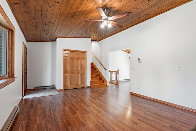 16881 169th Ave SE, Big Lake, MN 55309 - unfurnished living room with stairs, ceiling fan, wood finished floors, and a baseboard radiator