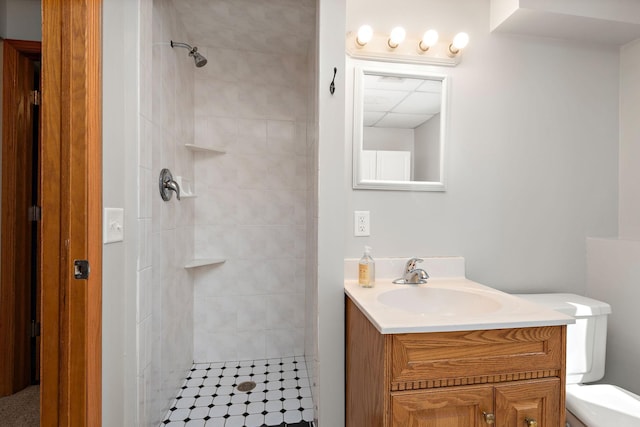 16881 169th Ave SE, Big Lake, MN 55309 - bathroom featuring toilet, tiled shower, and vanity