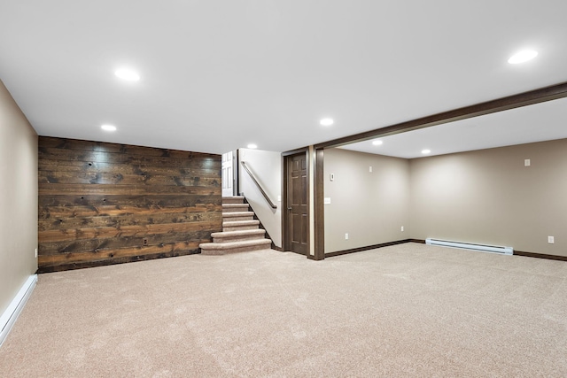 16881 169th Ave SE, Big Lake, MN 55309 - finished below grade area with a baseboard heating unit, recessed lighting, stairway, and carpet