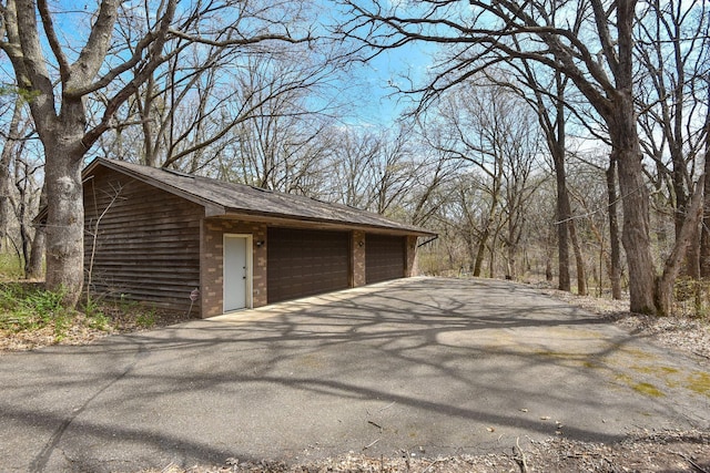 16881 169th Ave SE, Big Lake, MN 55309 - detached garage featuring driveway