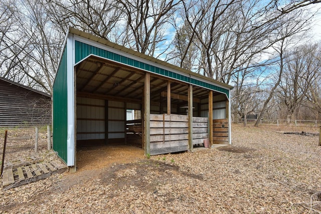 16881 169th Ave SE, Big Lake, MN 55309 - view of outbuilding featuring a carport, an exterior structure, and an outbuilding