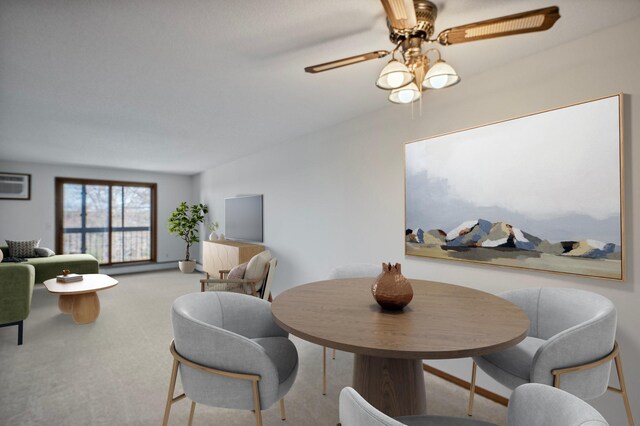 carpeted dining space featuring ceiling fan and a wall mounted AC