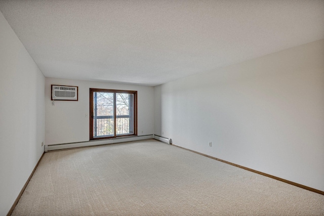 unfurnished room with a textured ceiling, a baseboard heating unit, baseboards, an AC wall unit, and light carpet