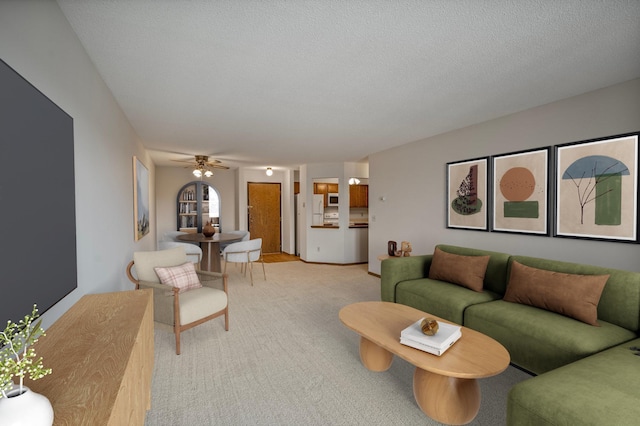 living area with a textured ceiling